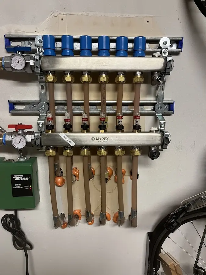 Plumber performing Water Heater Repair at a residential property in Spout Springs